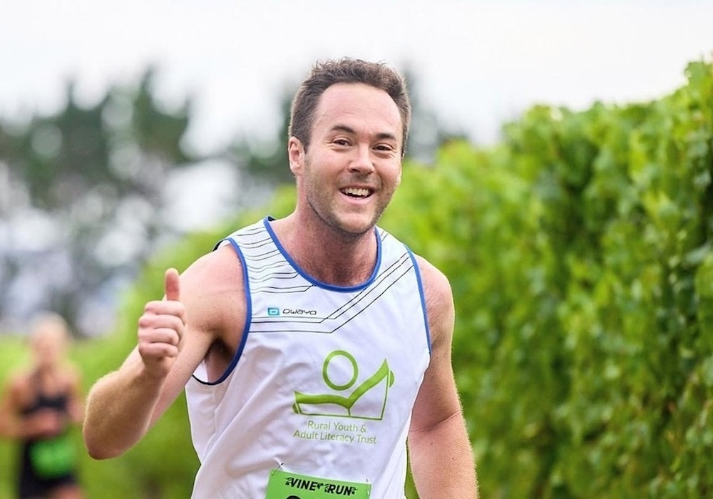 Rory Dean competing in half marathon wearing RYALT t-shirt